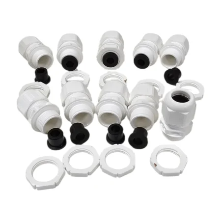 Pack of white cable glands with nuts and seals